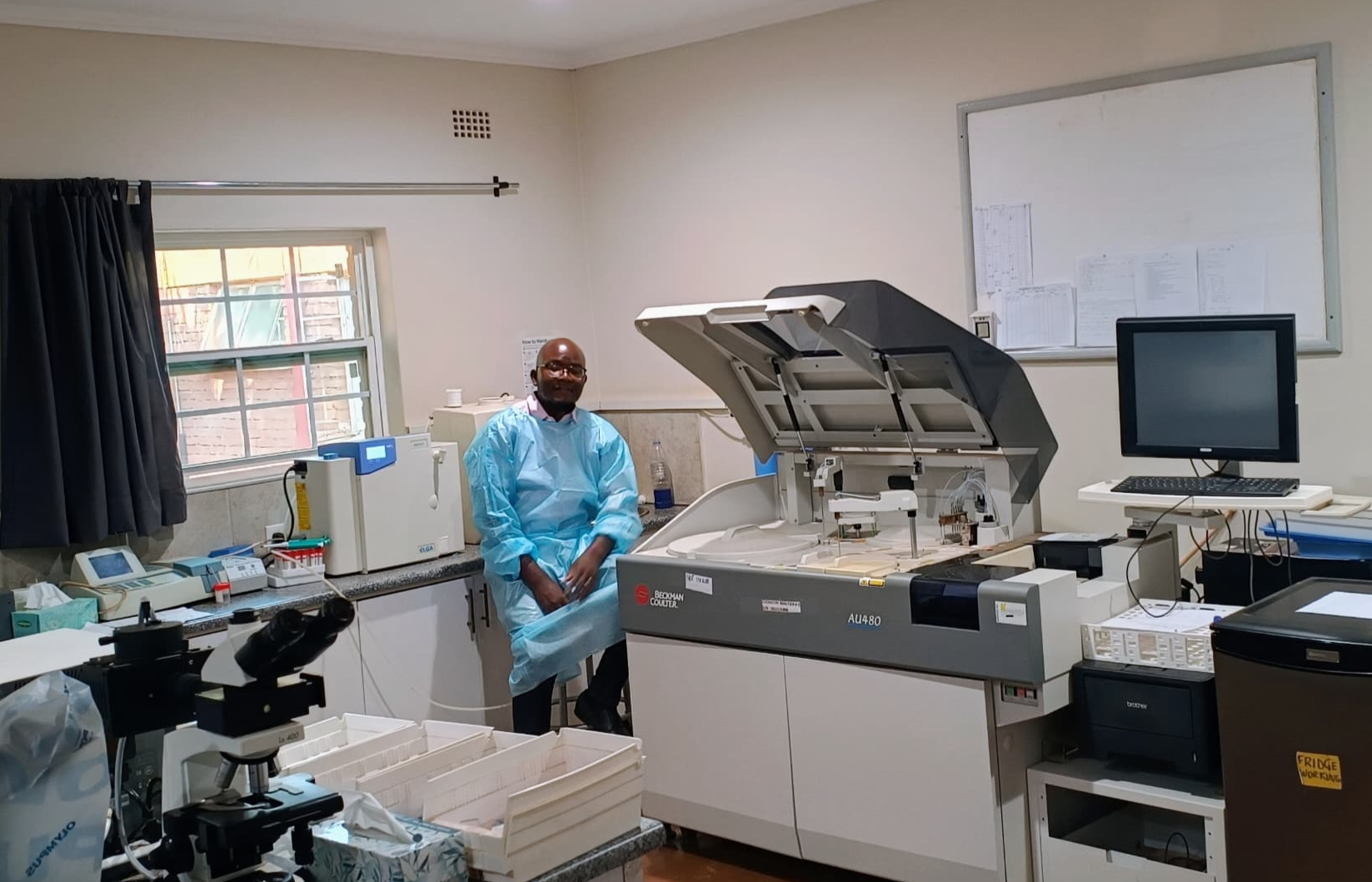 A team receiving technical training in a conference room